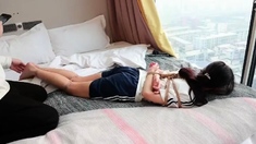 Asian Girl hogtied