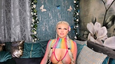Glamour babe with big boobs masturbates in lingerie