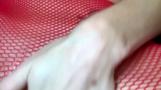 Redhead masturbates in a lacy panties and sheer stockings