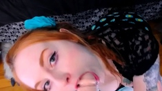 Redheaded amateur MILF with a sex toy on webcam show