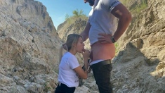 Blonde Babe Sucks a Big Cock Outdoors in a Canyon