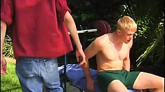 Naughty young gay playboys have some fun sucking dick poolside