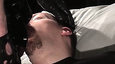 Latex wearing daddy Rob makes his man slave suck his cock and balls