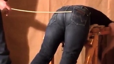 Caned over tight jeans Daddy boy