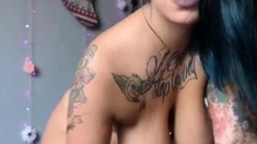 busty tattooed latin cam-slut